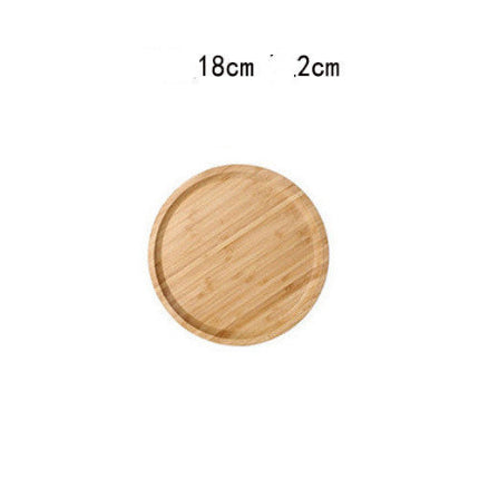 Wooden round tray with dimensions 18cm and 2cm on a white background. 