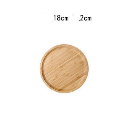 Wooden round tray with dimensions 18cm and 2cm on a white background. 