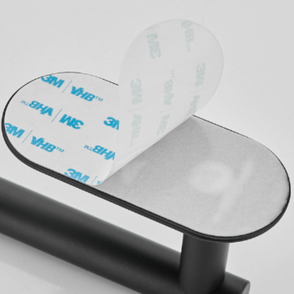 Clear adhesive patch with 3M branding on a gray/white background. 