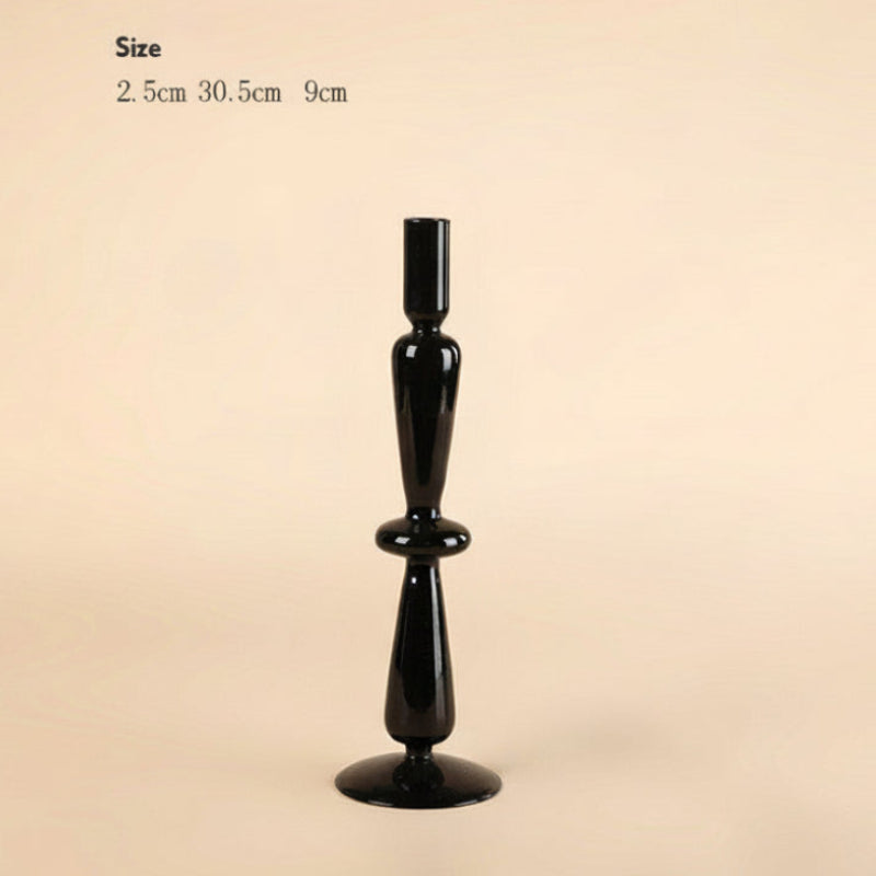 Black decorative candle holder with size measurements on a beige background. 
Scandinavian inspired minimalist decor design. Sleek and modern decor. 