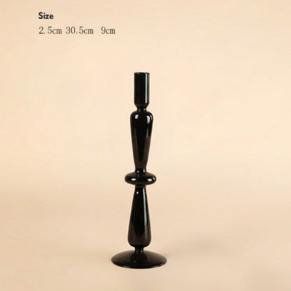 Black decorative candle holder with size measurements on a beige background. 
Scandinavian inspired minimalist decor design. Sleek and modern decor. 