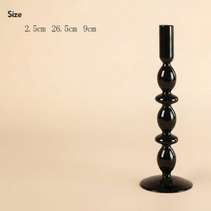 Large black decorative candle holder with size measurements on a beige background. 
Scandinavian inspired minimalist decor design. Sleek and modern decor. 