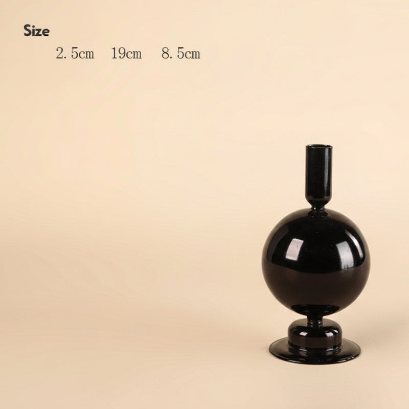 Black decorative candle holder with size measurements on a beige background. 
Scandinavian inspired minimalist decor design. Sleek and modern decor. 