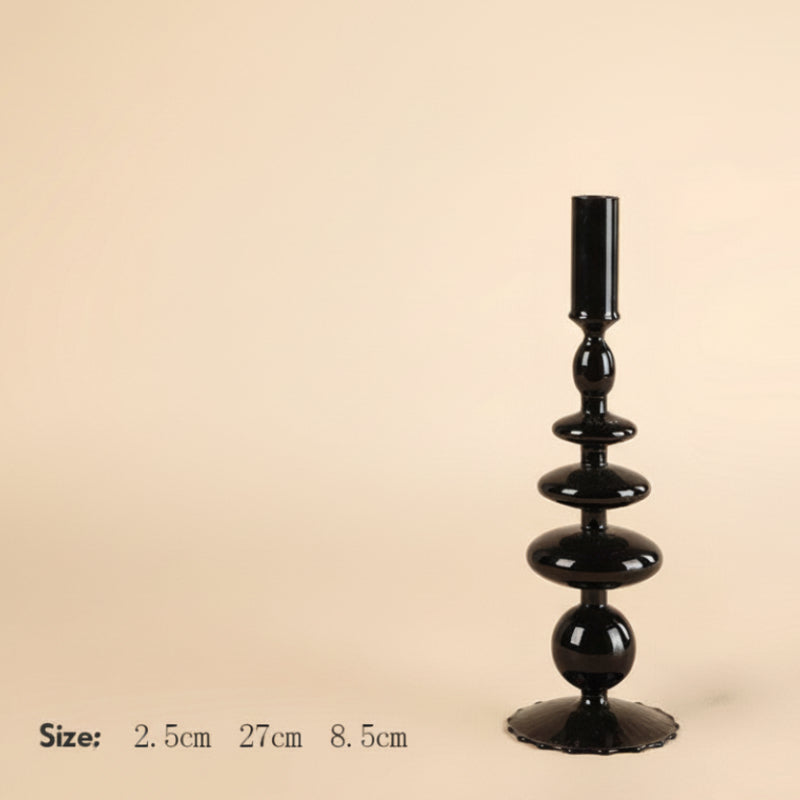 Black decorative candle holder with size measurements on a beige background. 
Scandinavian inspired minimalist decor design. Sleek and modern decor. 
