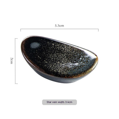 Stylish black star vein ceramic chopsticks holder, Japanese style with measurements on a white background. Modern kitchen accessories.   