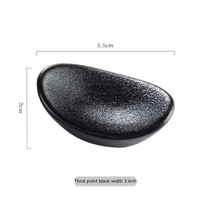 Stylish black ceramic chopsticks holder, Japanese style with measurements on a white background. Modern kitchen accessories.   
