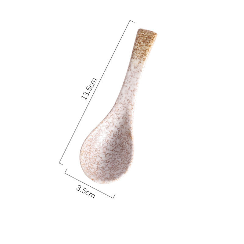 A handcrafted ceramic spoons with a speckled pattern in shades of brown, white and ocre on a white background and measurements. Handcrafted ceramic spoon in different colors. 