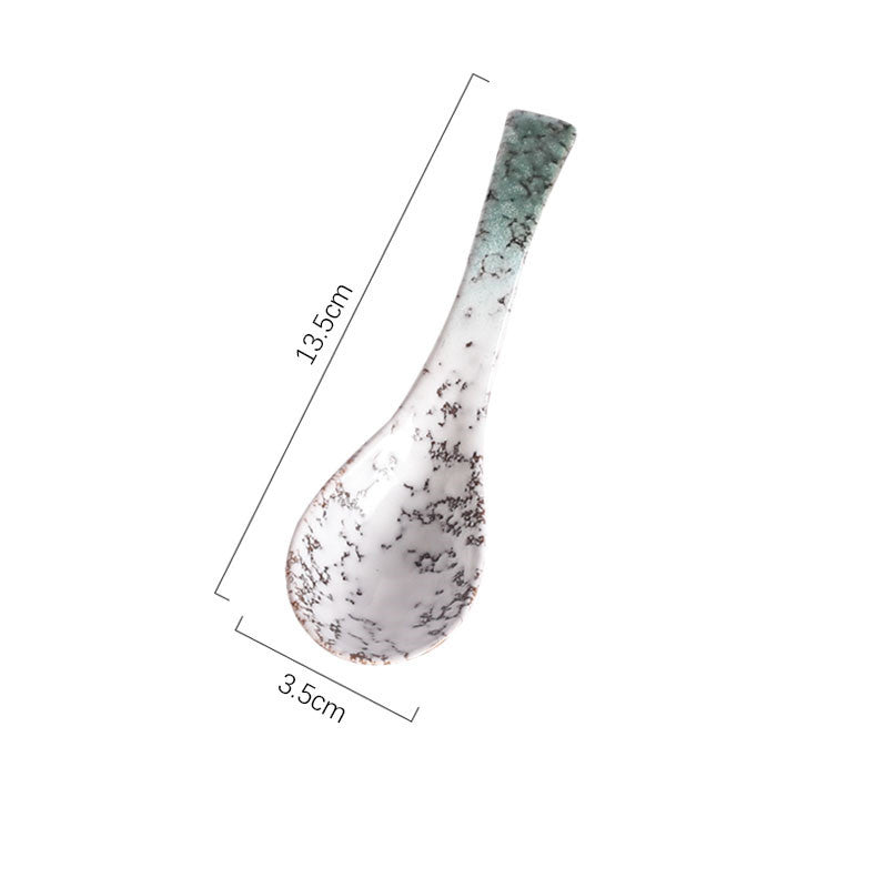 A handcrafted ceramic spoons with a speckled pattern in shades of white, brown, grey and green on a white background and measurements. Handcrafted ceramic spoon in different colors. 