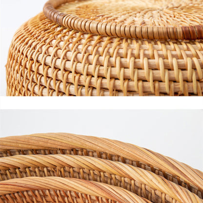 Close-up of a handmade rattan woven storage baskets on a white background. Earthy and natural kitchen and living room decor. 