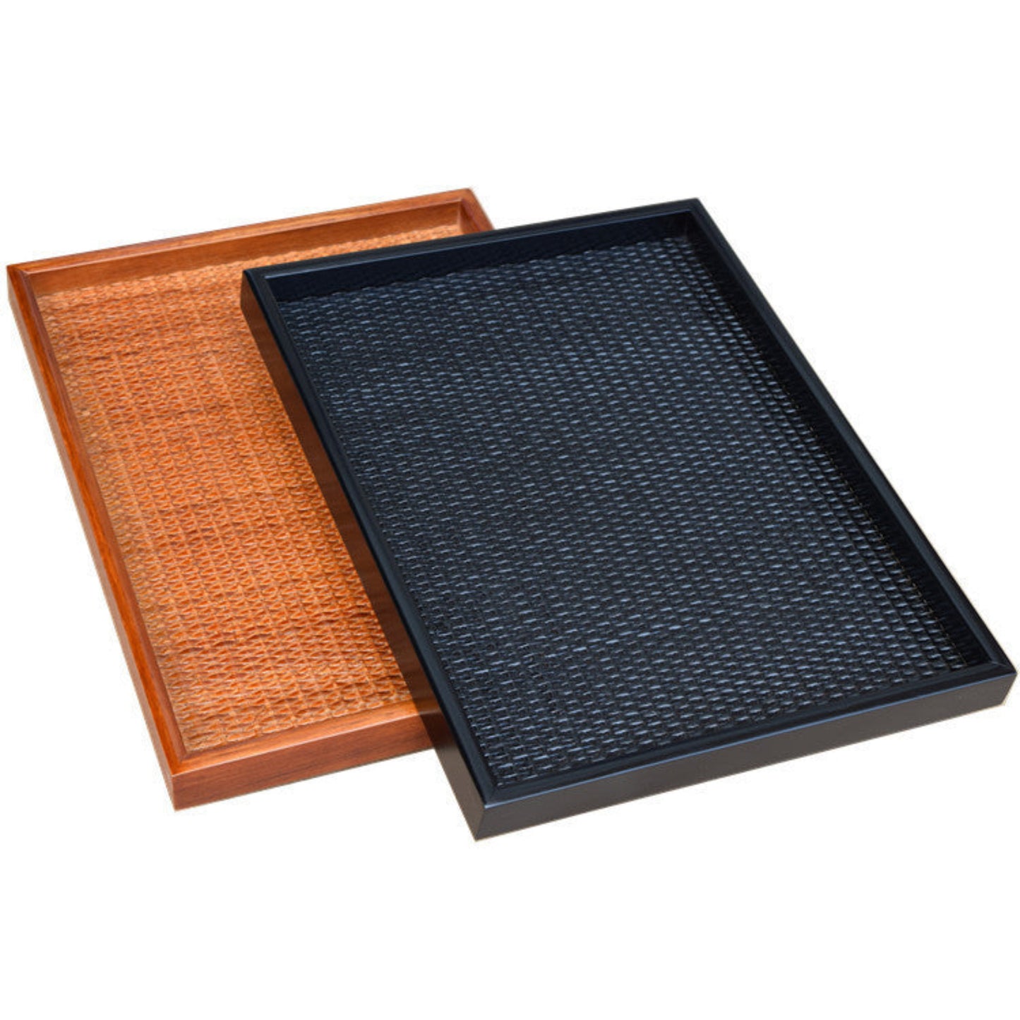 Two trays, one brown and one black, with a textured surface, on a white background.