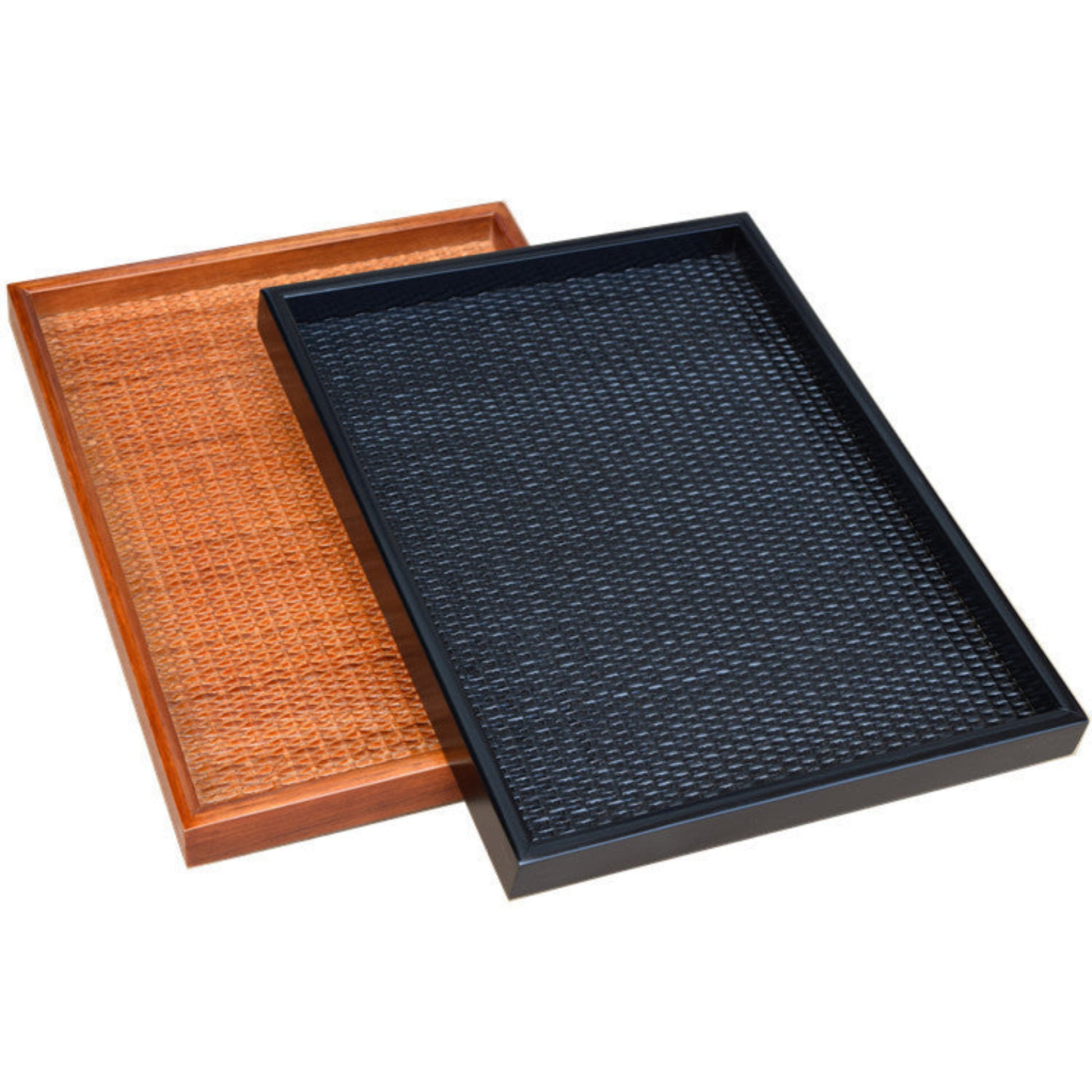 Two trays, one brown and one black, with a textured surface, on a white background.