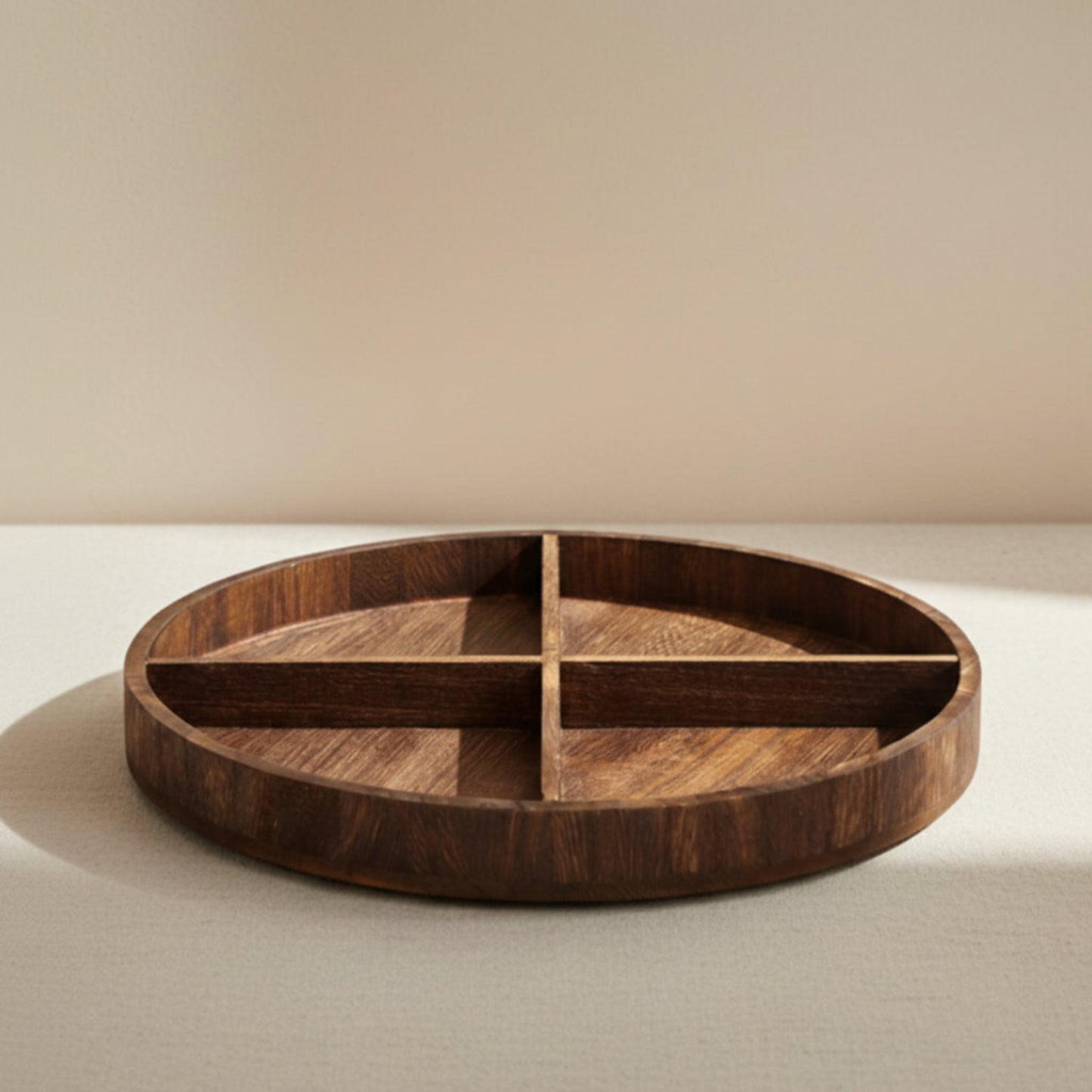 Wooden plate on a table. Natural decor styling in a modern, minimalist room/kitchen. Minimalist pieces designed to bring warmth and harmony. Beige Background. 