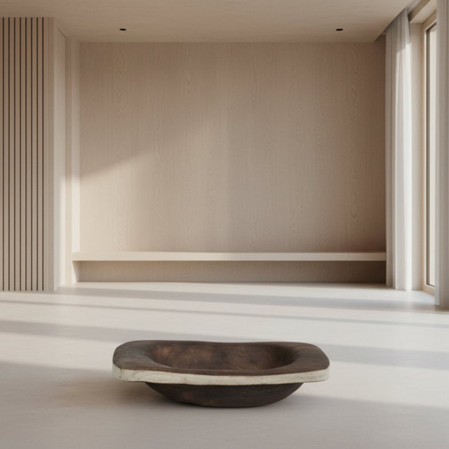 Wooden bowl on a light wooden floor with a neutral wall and window in the background. Beige background with a centerpiece wooden tray in the front. 