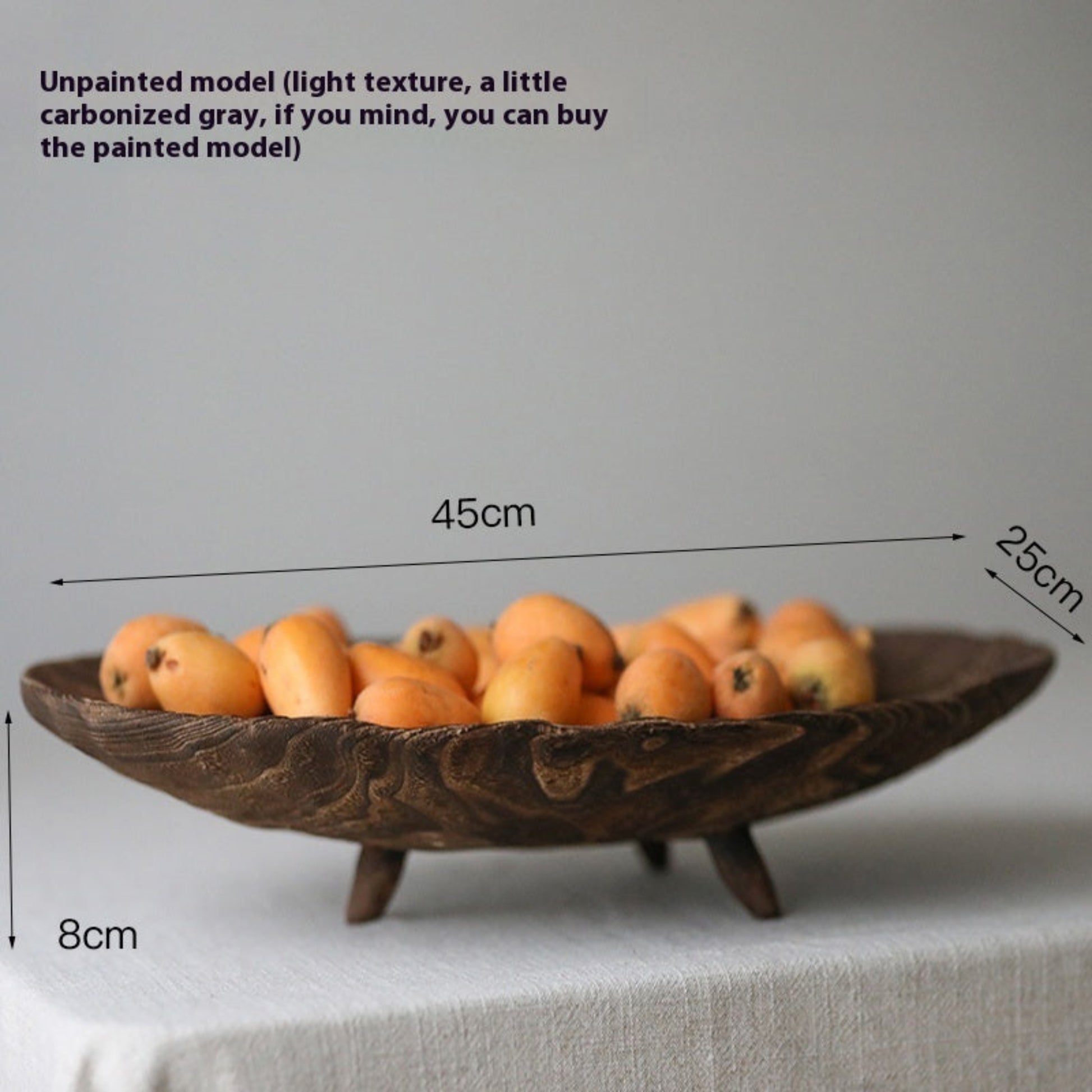 Large wooden tray with carvings and fruits on a light fabric surface and a white background - with measurements. Minimalist and Scandinavian home decor with earthy ambience. 