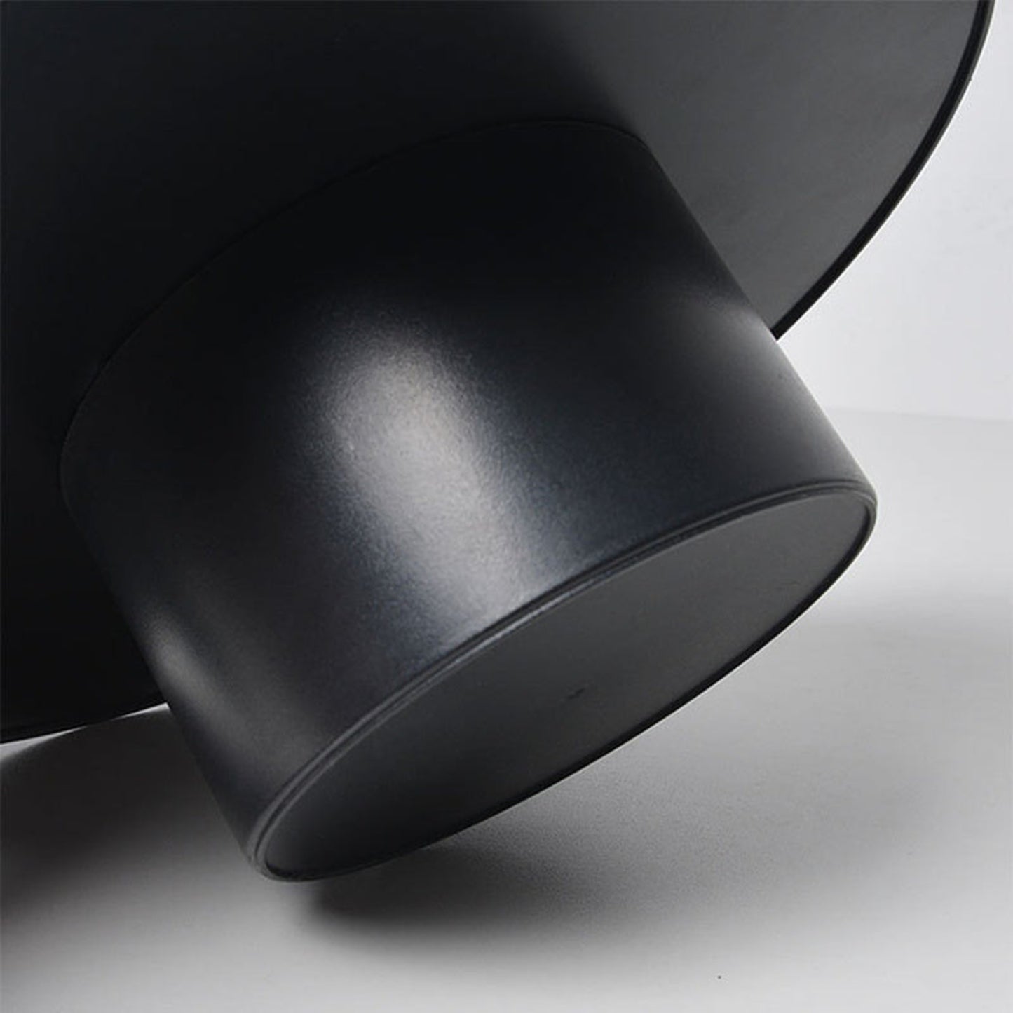 Close-up of a black tray with a modern design on a light gray background. Minimalist home decor. Timeless and minimalist design. 
